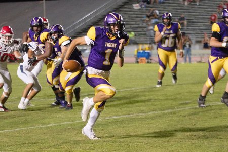 Tigers' gridiron team surprised as Sanger High outguns Lemoore in Tiger Stadium 42-13 Tiger quarterback Johnny Cunha